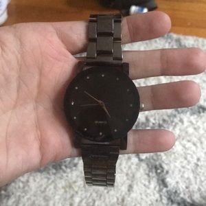 Black men’s watch with silver accents